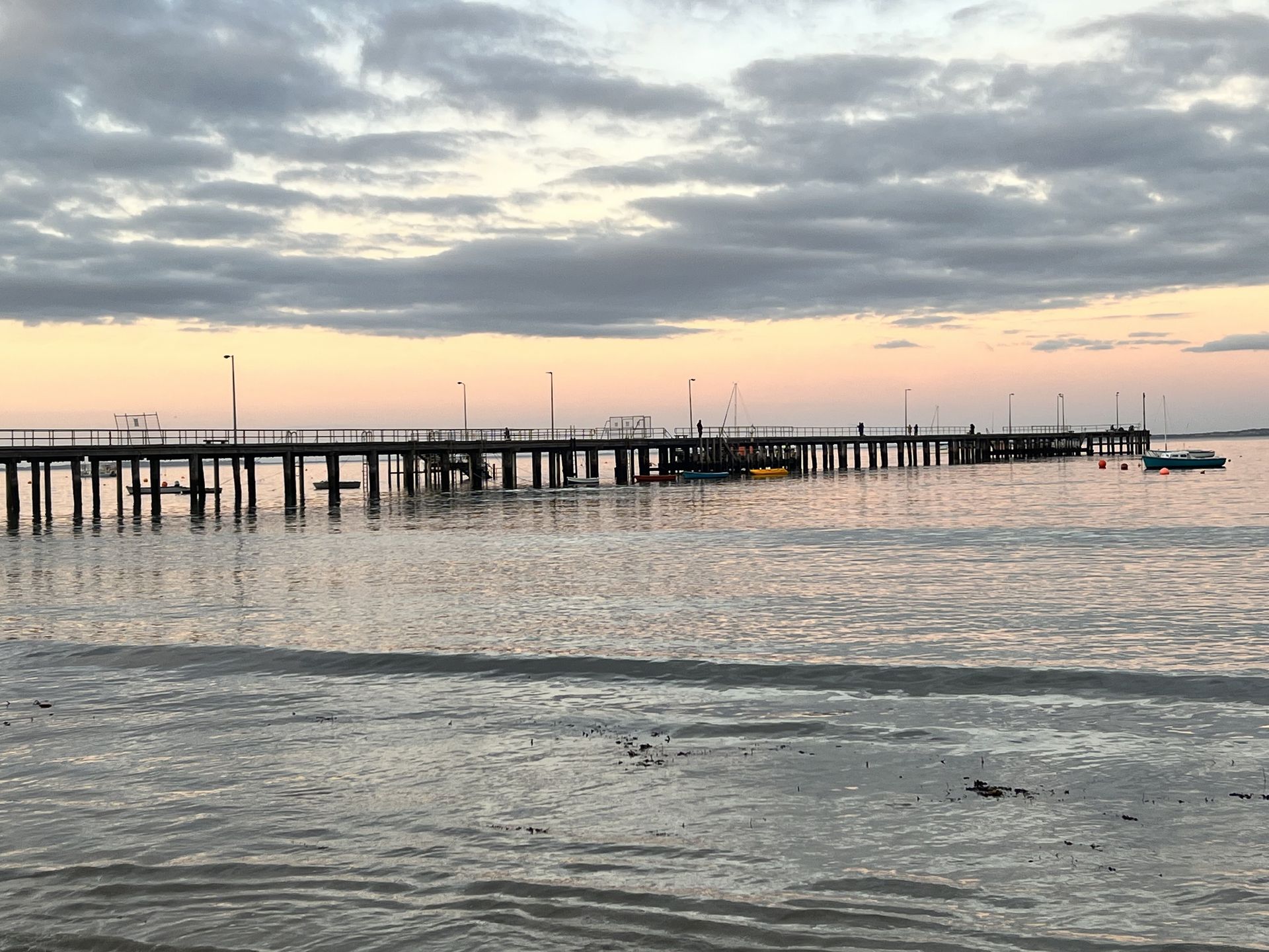 Coastal sunset over calm waters
